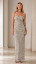 Model wearing Champagne strapless sweetheart sequin column evening gown front view