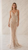 Front view of champagne beaded pearl and feather mermaid evening gown