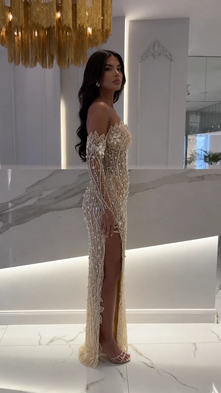 Side angle of champagne embellished formal maxi dress showing side slit