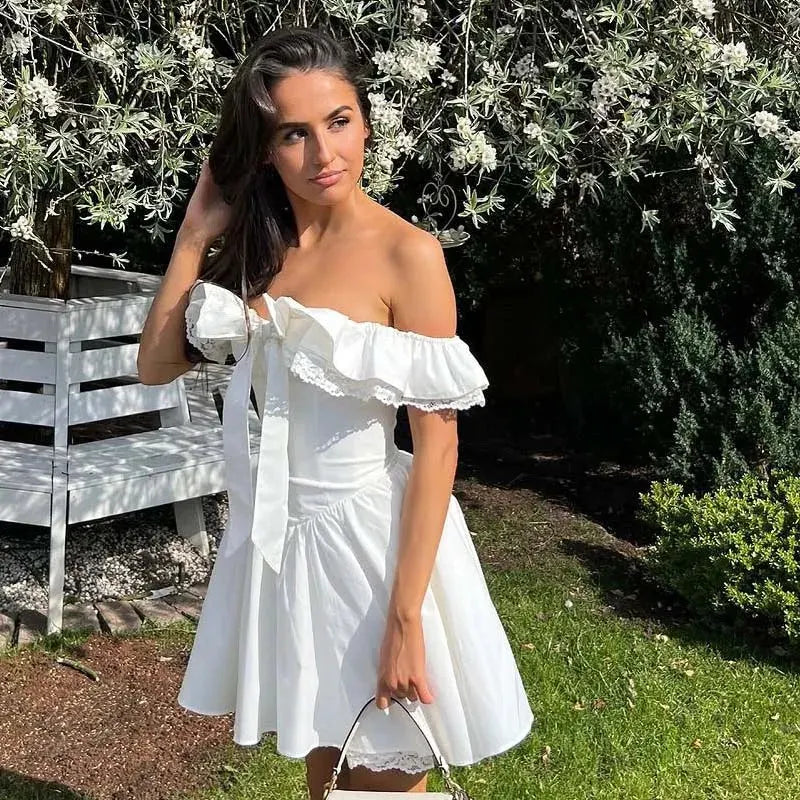 Evienne Off-Shoulder Corset Mini Dress – White Ruffle Bow Summer Dress for Garden Parties and Holiday Looks