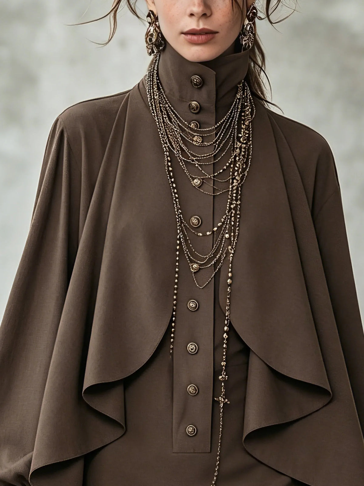 Chocolate high-neck mini dress with cape-style paneling