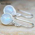 Round winding opal earrings